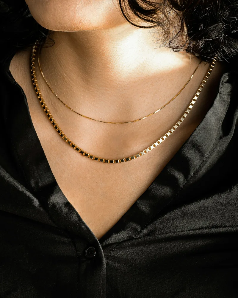 Layered boho chain necklaces worn together