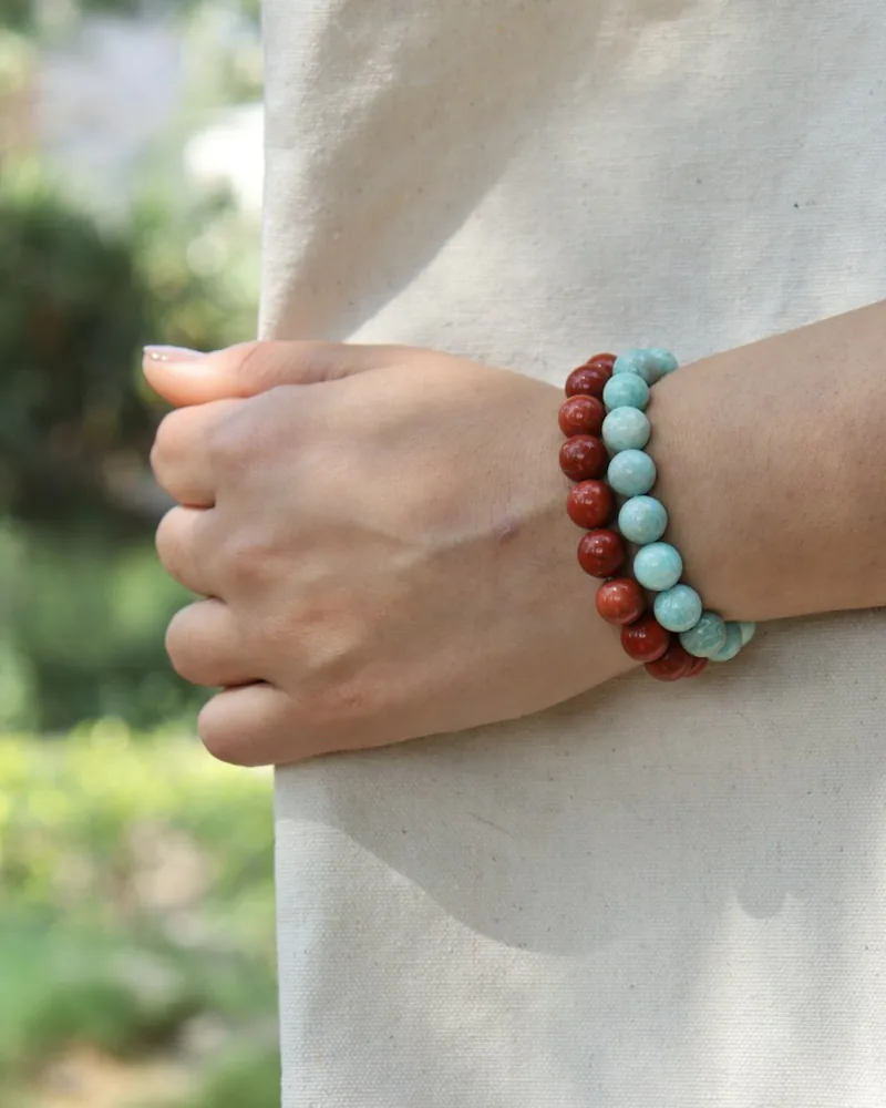 Gemstone bead yoga bracelets on a wrist