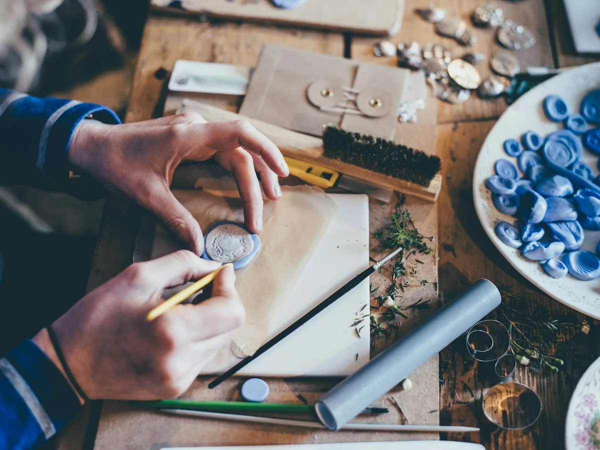 Silversmith’s workbench with hand tools for making silver jewelry